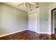 Bedroom featuring hardwood floors, a closet with white doors and hardwood floors at 1858 Michigan Ne Ave, St Petersburg, FL 33703
