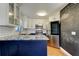 Updated kitchen featuring an island and stainless steel appliances with custom finishes at 1858 Michigan Ne Ave, St Petersburg, FL 33703