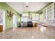 The kitchen features stainless steel appliances, stone countertops, and a functional design at 1902 N Tampania Ave, Tampa, FL 33607