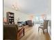 Bright living room featuring wood floors and sliding glass doors at 19029 Us Highway 19 N # 3-1, Clearwater, FL 33764