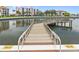 Picturesque view of the pier overlooking the tranquil water, ideal for serene waterfront living at 19029 Us Highway 19 N # 3-1, Clearwater, FL 33764