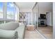 Bright sunroom offering a cozy seating area and views of the surrounding scenery at 19029 Us Highway 19 N # 3-1, Clearwater, FL 33764