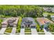 Spacious single-Gathering home with a lush lawn, situated in a peaceful, wooded neighborhood at 1958 Marshberry Ct, Trinity, FL 34655