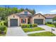 A charming single-Gathering home with a two-car garage and manicured lawn at 1958 Marshberry Ct, Trinity, FL 34655