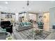 Spacious living room that opens to a kitchen and dining area, providing an airy atmosphere at 1958 Marshberry Ct, Trinity, FL 34655