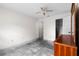 Bedroom with empty floor and ceiling fan awaiting your personal touch and design at 2006 Hadrian Ct, Sun City Center, FL 33573