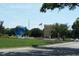 The community features picturesque landscaping, walkways, and a world globe landmark in a park-like setting at 2221 Norwegian Dr # 15, Clearwater, FL 33763