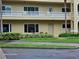 Charming condo exterior with lovely balcony and well-maintained landscaping at 2221 Norwegian Dr # 15, Clearwater, FL 33763