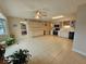 Spacious kitchen with tile flooring, ceiling fan, light cabinetry, and modern appliances at 2221 Norwegian Dr # 15, Clearwater, FL 33763