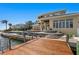 Stunning waterfront home with a dock, patio, and landscaped yard, perfect for outdoor living and entertaining at 2279 Mermaid Ne Pt, St Petersburg, FL 33703
