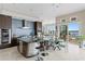 Gourmet kitchen featuring a large island, stainless steel appliances, and eat in dining area at 2279 Mermaid Ne Pt, St Petersburg, FL 33703