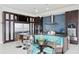 Stylish kitchen with a large island, seating, modern stainless steel appliances and custom backsplash at 2279 Mermaid Ne Pt, St Petersburg, FL 33703