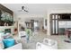 Bright, open living room features a fireplace, high ceilings, and modern decor at 2279 Mermaid Ne Pt, St Petersburg, FL 33703
