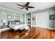 Main bedroom suite features hardwood floors, stylish accents, and neutral wall paint at 2279 Mermaid Ne Pt, St Petersburg, FL 33703