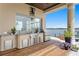 Back patio outdoor kitchen with stainless steel appliances and a waterfront view at 2279 Mermaid Ne Pt, St Petersburg, FL 33703