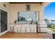 Back patio outdoor kitchen with stainless steel appliances, sink, and spacious countertops at 2279 Mermaid Ne Pt, St Petersburg, FL 33703