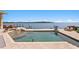 Beautiful backyard pool with outdoor seating area and direct access to the water at 2279 Mermaid Ne Pt, St Petersburg, FL 33703