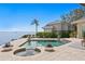 A beautiful pool and spa nestled near the water, with lush landscaping and peaceful ambience at 2279 Mermaid Ne Pt, St Petersburg, FL 33703
