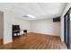 This basement has tile floors and a view of an office area at 412 Manor Blvd, Palm Harbor, FL 34683