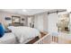 The primary bedroom shows a barn door that enters to the primary bathroom at 412 Manor Blvd, Palm Harbor, FL 34683