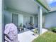 This covered patio is a cozy outdoor space with sliding glass doors leading to the house at 4315 Whittner Dr, Land O Lakes, FL 34639