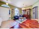 Inviting foyer with tile floors, a large window, and stylish furnishings at 4315 Whittner Dr, Land O Lakes, FL 34639