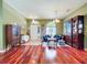 Inviting living room with hardwood floors, arched windows, and stylish furniture at 4315 Whittner Dr, Land O Lakes, FL 34639