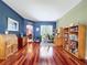 Comfortable office space with a bright window, a desk, and built-in bookshelves at 4315 Whittner Dr, Land O Lakes, FL 34639