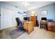 Office room offers a desk, computer setup, closet, and a neutral color scheme at 4315 Whittner Dr, Land O Lakes, FL 34639