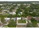Wide aerial shot presenting the housing development's design and natural surroundings at 4323 S Lois Ave, Tampa, FL 33611