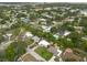 Aerial view highlighting the community's serene setting and nearby recreational spaces at 4323 S Lois Ave, Tampa, FL 33611