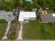 Aerial view of property with green backyard and neighboring houses at 4323 S Lois Ave, Tampa, FL 33611