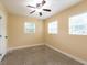 Bedroom with natural light, ceiling fan and neutral color scheme at 4323 S Lois Ave, Tampa, FL 33611