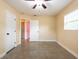 Comfortable bedroom featuring natural lighting and closet access at 4323 S Lois Ave, Tampa, FL 33611