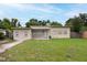 Charming single story home with a well-maintained lawn and welcoming entrance, perfect for easy living at 4323 S Lois Ave, Tampa, FL 33611