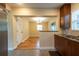 Open kitchen featuring modern appliances and an adjacent dining area at 4323 S Lois Ave, Tampa, FL 33611