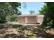 View of the backyard and the exterior side of the home at 4572 33Rd N Ave, St Petersburg, FL 33713