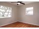 Bedroom with hardwood floors and lots of natural light from the two large windows at 4572 33Rd N Ave, St Petersburg, FL 33713