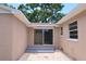 Exterior patio with access to interior room, pavers, and outdoor lighting at 4572 33Rd N Ave, St Petersburg, FL 33713