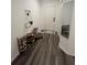 Inviting hallway with shoe storage and a decorative mirror, enhancing functionality at 4743 Deer Track St, Tampa, FL 33610