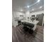 Modern kitchen with granite countertops, stainless steel appliances, and a central island at 4743 Deer Track St, Tampa, FL 33610