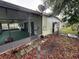 Exterior view of the back of the home, showing the porch at 4920 S 82Nd St, Tampa, FL 33619