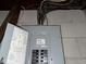 Close up of electrical panel in an unfinished basement with cinder block walls at 4920 S 82Nd St, Tampa, FL 33619