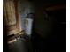 Basement view of water heater and block wall at 4920 S 82Nd St, Tampa, FL 33619