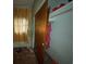 Bedroom closet featuring shelving with clothing and personal items at 4920 S 82Nd St, Tampa, FL 33619