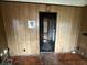 Hallway view shows doorway and some needed repairs at 4920 S 82Nd St, Tampa, FL 33619