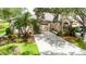 Charming single Gathering home featuring a well manicured lawn and attached garage at 5143 Lochmead Ter, Zephyrhills, FL 33541
