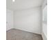 Clean bedroom with a large window that provides ample natural light and pleasant views at 6043 Piedmont Dr, Spring Hill, FL 34606