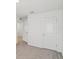 A clean bedroom with lots of open space and a neutral color palette at 6043 Piedmont Dr, Spring Hill, FL 34606
