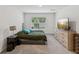 Bedroom boasts natural light, plush carpet, a dresser, and a cozy feel at 6043 Piedmont Dr, Spring Hill, FL 34606